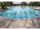 Well-maintained swimming pool with marked lanes and clear water, perfect for exercise and relaxation at 4080 Prima Lago Cir, Lakeland, FL 33810