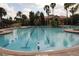 Large swimming pool featuring lap lanes and ample space for recreation and exercise at 4080 Prima Lago Cir, Lakeland, FL 33810