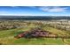 Scenic aerial view of the community, featuring lush golf course, ponds, and well-maintained residential buildings at 417 Enclave Pl # 2, Lakeland, FL 33803