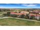 A beautiful aerial view highlighting the residential buildings next to the golf course at 417 Enclave Pl # 2, Lakeland, FL 33803