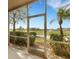 Enjoy golf course views from this screened lanai overlooking lush landscaping at 417 Enclave Pl # 2, Lakeland, FL 33803