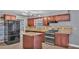 Kitchen featuring stainless steel appliances, a center island, and granite countertops at 4601 Sw Reynosa Sw Dr, Winter Haven, FL 33880