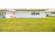 Well-maintained backyard with a white building at 474 Cameo Dr, Lakeland, FL 33803