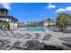 Sparkling community pool and sun loungers create a relaxing atmosphere for residents and their guests at 5002 Rain Shadow Dr, St Cloud, FL 34772