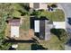 An aerial view shows the property's layout, including the backyard shed and concrete sports court at 5121 Idlewood Ln, Lakeland, FL 33811