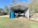 Spacious metal storage shed with two boat storage, perfect for storing equipment or vehicles in a secure location at 5121 Idlewood Ln, Lakeland, FL 33811