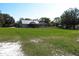 Extensive backyard featuring a covered patio and a screened-in patio at 5626 Sawyer Rd, Lakeland, FL 33810