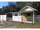 Exterior of building with fenced-in yard at 5626 Sawyer Rd, Lakeland, FL 33810