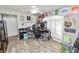 Spacious bedroom with ample natural light, ceiling fan, and wood-look tile flooring at 5942 White Tail Loop, Lakeland, FL 33811