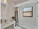 Beautiful bathroom with white subway tiles, updated sink and fixtures, and shower and tub combo at 6224 Crane Dr, Lakeland, FL 33809