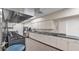 Commercial kitchen featuring stainless steel counters, an industrial range, and ample storage space at 6224 Crane Dr, Lakeland, FL 33809