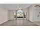 Spacious living room featuring modern floors and a large window that provides natural light at 6224 Crane Dr, Lakeland, FL 33809