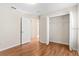 This bright bedroom features hardwood floors and a spacious closet at 623 Nicholson Dr, Davenport, FL 33837