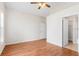 Spacious main bedroom with vaulted ceiling and wood flooring; bathroom and closet are visible at 623 Nicholson Dr, Davenport, FL 33837