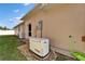 Exterior view of a home featuring a Generac generator, ensuring energy independence at 6271 Res Cir, Lakeland, FL 33810