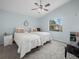 Comfortable bedroom with vaulted ceiling, ceiling fan, and two twin beds at 6337 Egret Dr, Lakeland, FL 33809