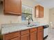 Kitchen sink and counter, granite, and white cabinets at 6337 Egret Dr, Lakeland, FL 33809