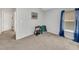 Neutral bedroom featuring medium tone carpet and natural light from the window at 6838 Shimmering Dr, Lakeland, FL 33813