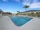 Community pool offers a refreshing retreat with a relaxing pool and ample seating at 6838 Shimmering Dr, Lakeland, FL 33813