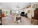 Bright living room featuring a ceiling fan, comfortable seating and natural light at 6846 Ashbury Dr, Lakeland, FL 33809