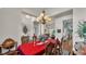 Formal dining room with sophisticated decor and lighting at 6942 Indian Creek Park Dr, Lakeland, FL 33813