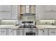 Chef's kitchen features a stainless steel oven and gas cooktop at 6942 Indian Creek Park Dr, Lakeland, FL 33813