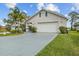 Charming home with landscaped yard, driveway, and attached two-car garage at 720 Lake Jessie Dr, Winter Haven, FL 33881