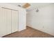 Bedroom featuring laminate flooring and a closet for storage space at 736 Hunt Dr, Lake Wales, FL 33853