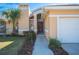 Inviting entryway features a stylish front door, and neatly landscaped walkway at 736 Hunt Dr, Lake Wales, FL 33853