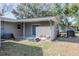 Backyard featuring storage shed, chicken coup, and mature trees at 808 Spirit Lake Rd, Winter Haven, FL 33880