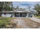 Charming single-story home with a covered front entrance and freshly painted exterior at 808 Spirit Lake Rd, Winter Haven, FL 33880