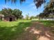 Expansive backyard with a large shed and plenty of green space at 116 S Lanier Ave, Fort Meade, FL 33841