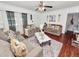 The living room features two couches, a coffee table, and decor accents at 116 S Lanier Ave, Fort Meade, FL 33841