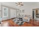 Inviting living room with hardwood floors, comfortable seating, and lots of natural light at 1539 E Fern Rd, Lakeland, FL 33801