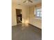 Dining area with built-in cabinets and shelves, adjacent to a galley kitchen at 1560 Imperial Ave, Bartow, FL 33830