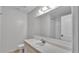 Bathroom features a vanity with white countertop and a shower/tub combination at 1702 Valencia Blvd, Bartow, FL 33830