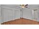 Bright bedroom with ceiling fan and closet at 1702 Valencia Blvd, Bartow, FL 33830