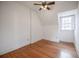 Bedroom featuring hardwood floors, ceiling fan and abundant natural light at 1819 Pawnee Trl, Lakeland, FL 33803