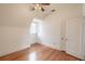 Bedroom featuring hardwood floors, ceiling fan and abundant natural light at 1819 Pawnee Trl, Lakeland, FL 33803