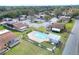 Aerial view of the community pool area showcasing the swimming pool and surrounding green space at 1880 N Crystal Lake Dr # 4, Lakeland, FL 33801