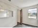 Bedroom featuring neutral walls, closet, and a window allowing natural light at 1880 N Crystal Lake Dr # 4, Lakeland, FL 33801