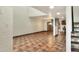 Spacious living room with tile floors and high ceilings at 1880 N Crystal Lake Dr # 4, Lakeland, FL 33801