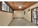 Enclosed sunroom featuring multiple windows and sliding glass doors to the main house at 1880 N Crystal Lake Dr # 4, Lakeland, FL 33801