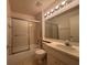 This bathroom has a tub and shower combination and a vanity at 2021 Windward Pass, Lakeland, FL 33813