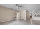 Spacious living room featuring tile flooring, light colored walls, and neutral colors throughout the room at 211 Emanuelle Dr, Winter Haven, FL 33884