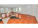 Bright living room featuring unique star-patterned tile floors and white walls at 2330 Creek Side Dr, Lakeland, FL 33811