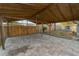 View of a covered backyard patio with stone flooring at 2330 Creek Side Dr, Lakeland, FL 33811