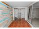 Sunroom with a sliding door and a creative wood accent wall at 2330 Creek Side Dr, Lakeland, FL 33811