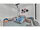 ' bedroom with playful decor, colorful bedding, musical keyboard and accent wall at 275 Canterwood Ln, Mulberry, FL 33860