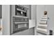 Modern appliances in a gray kitchen, showing the coffee maker, oven, and microwave at 275 Canterwood Ln, Mulberry, FL 33860